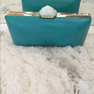 Trina Turk turquoise clutch with white clasp